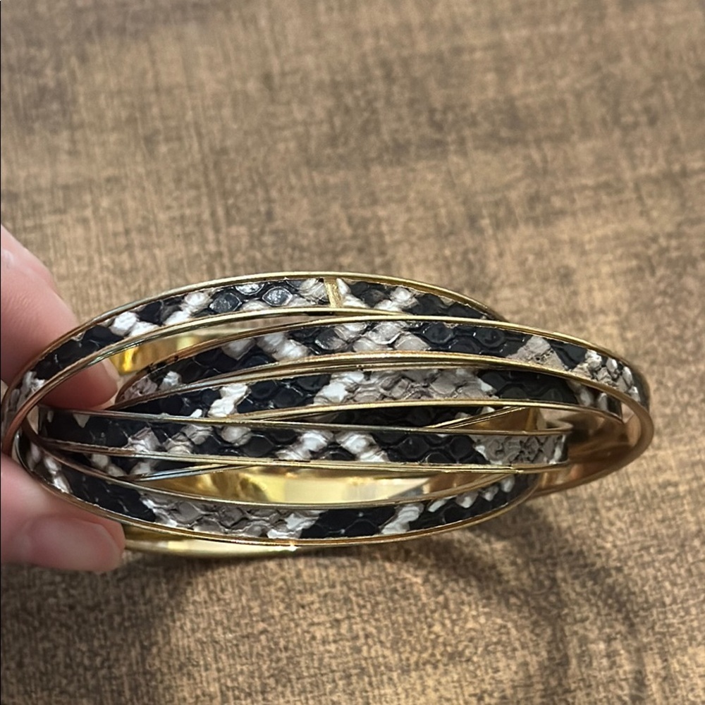 Gold Tone Intertwined Snake Print Bangles